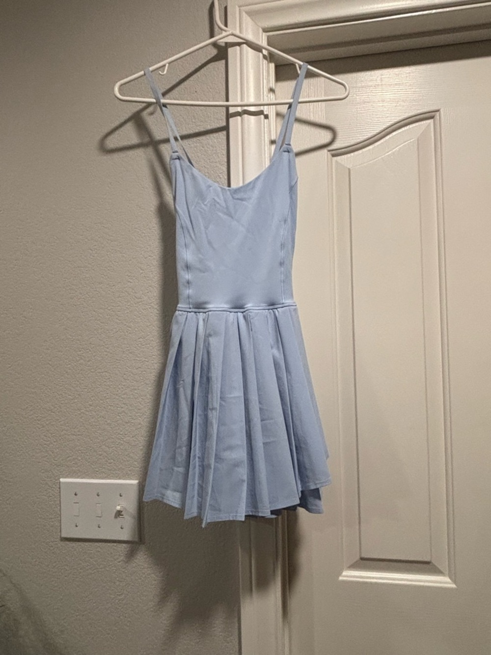 NWOT Light Blue Spaghetti Strap Pleated Skater Dress with attached shorts.